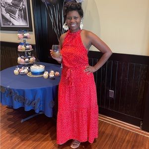 Red Polka dot Halter dress with belt. Tiered detail, slight high low front